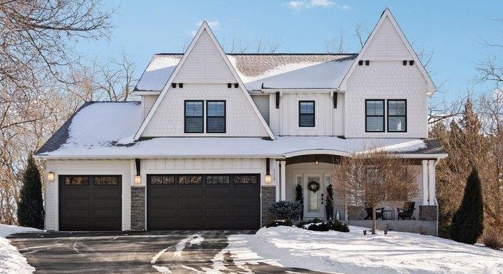 a house covered in snow